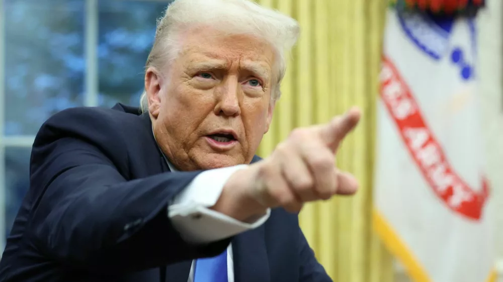 U.S. President Donald Trump speaks in the Oval Office of the White House in Washington, D.C., U.S., February 11, 2025.  REUTERS/Kevin Lamarque