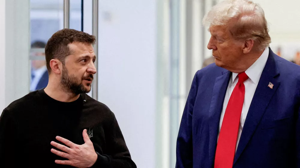 FILE PHOTO: Republican presidential nominee and former U.S. President Donald Trump and Ukraine's President Volodymyr Zelenskiy meet at Trump Tower in New York City, U.S., September 27, 2024. REUTERS/Shannon Stapleton/File Photo