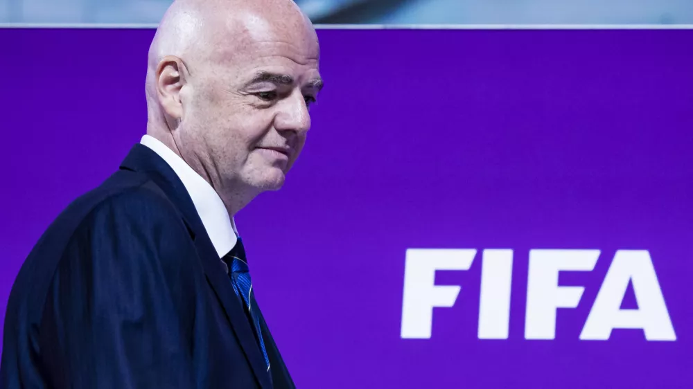 FILED - 16 December 2022, Qatar, Doha: FIFA President Gianni Infantino speaks at a press conference. Infantino was on Thursday re-elected unopposed as president of football's ruling body FIFA for a four-year term until 2027. Photo: Tom Weller/dpa