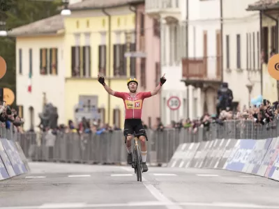 Fredrik Dversnes of Uno-X Mobility celebrates winning the stage, Stage 5 from Ascoli Piceno to Pergola during the 60th Tirreno - Adriatico cycling race, in Pergola, Italy, Friday March 14, 2025. (Massimo Paolone/LaPresse via AP)