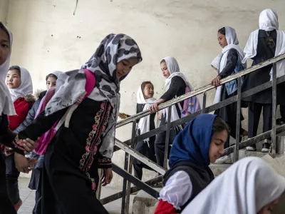 Girls attend school on the first day of the new school year, in Kabul, Afghanistan, on Saturday, March 25, 2023. The new Afghan educational year started, but high school remained closed for girls for the second year after Taliban returned to power in 2021. (AP Photo/Ebrahim Noroozi)