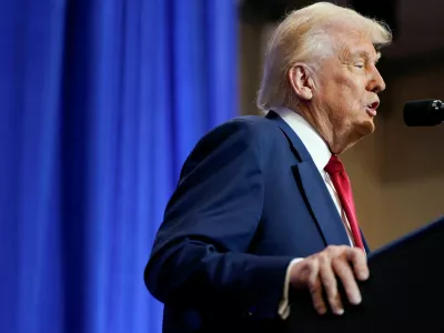U.S. President Donald Trump speaks during his visit to the Department of Justice to address its workers, in Washington, D.C., U.S., March 14, 2025. REUTERS/Nathan Howard