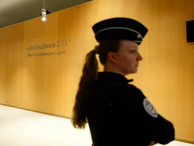 French police officer stands outside the audience room on the day of the trial of French actor Gerard Depardieu for two sexual assaults allegedly committed on the set of the film "Les Volets Verts", in Paris, France, March 24, 2025. REUTERS/Sarah Meyssonnier