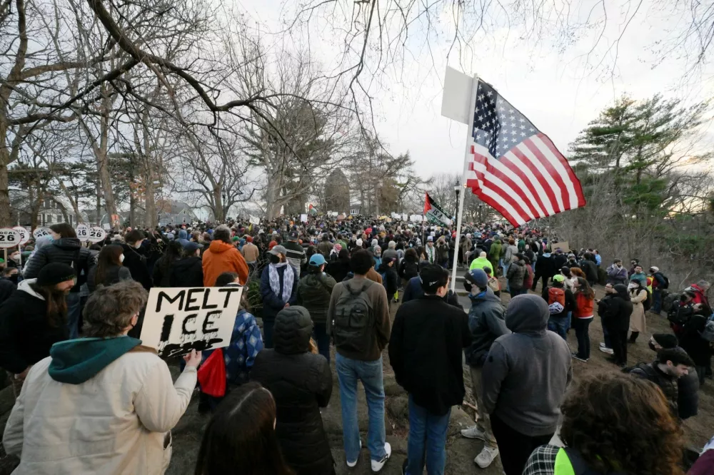 Demonstrators take part in the Stand with Rumeysa Ozturk,Tufts PHD Student emergency rally, at Powder House Square Park, after Ozturk was taken into custody by federal agents, in Somerville, Massachusetts, U.S. March 26, 2025. REUTERS/Faith Ninivaggi