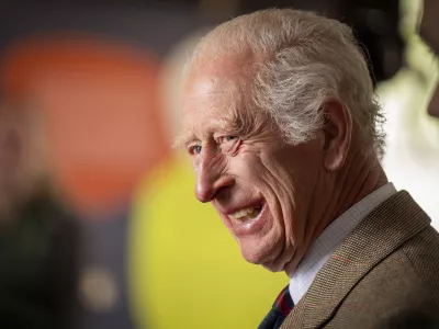 FILE - Britain's King Charles III smiles during his visit to the Forsinard Flows Visitor Centre in Forsinard, Highland, Scotland, July 31, 2024. (Jane Barlow/Pool Photo via AP, File)