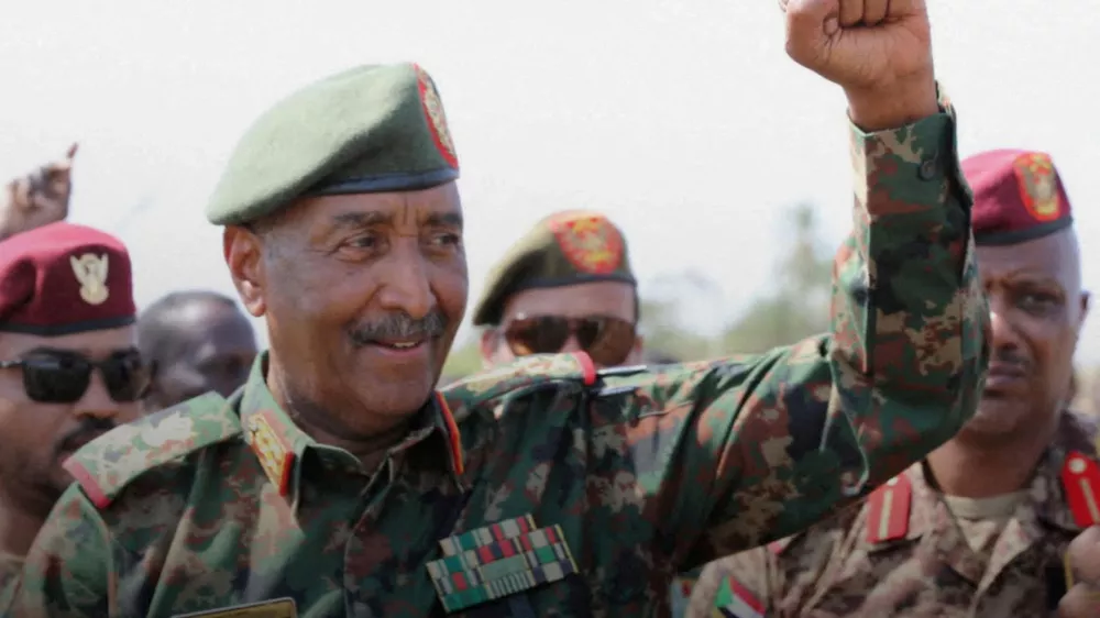 FILE PHOTO: Sudan's army chief Abdel Fattah al-Burhan gestures to soldiers inside the presidential palace after the Sudanese army said it had taken control of the building, in the capital Khartoum, Sudan March 26, 2025. Sudan Transitional Sovereignty Council/Handout via REUTERS  THIS IMAGE HAS BEEN SUPPLIED BY A THIRD PARTY/File Photo