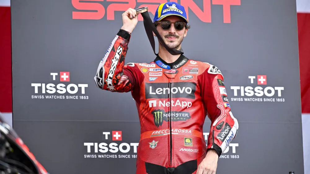 Mar 29, 2025; Austin, TX, USA; Francesco Bagnaia (63) of Italy and Ducati Lenovo Team celebrates after he finishes in third place in the sprint race before the 2025 MotoGP Grand Prix of the Americas at Circuit of The Americas. Mandatory Credit: Jerome Miron-Imagn Images