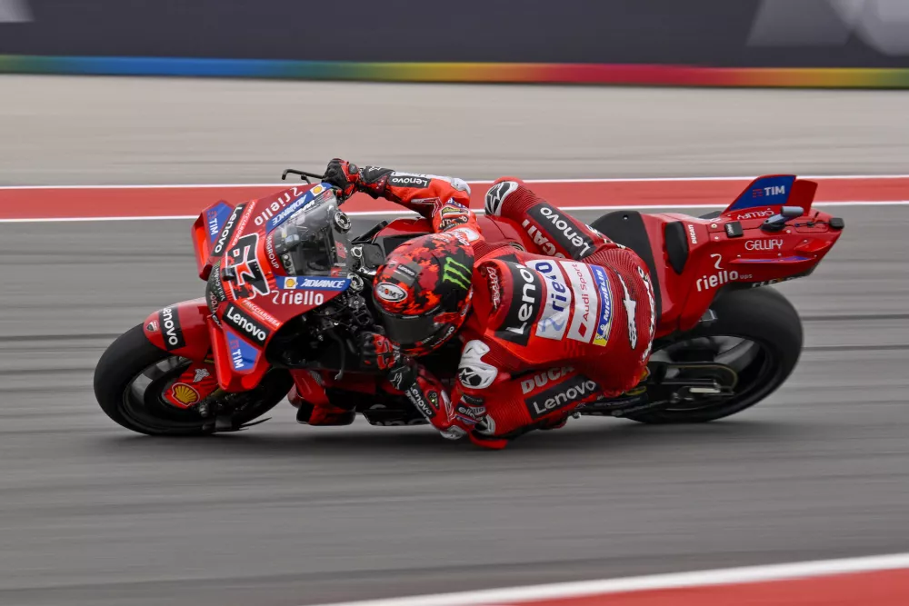 Mar 30, 2025; Austin, TX, USA; Francesco Bagnaia (63) of Italy and Ducati Lenovo Team rides in warm ups before the start of the 2025 Grand Prix of the Americas at Circuit of The Americas. Mandatory Credit: Jerome Miron-Imagn Images