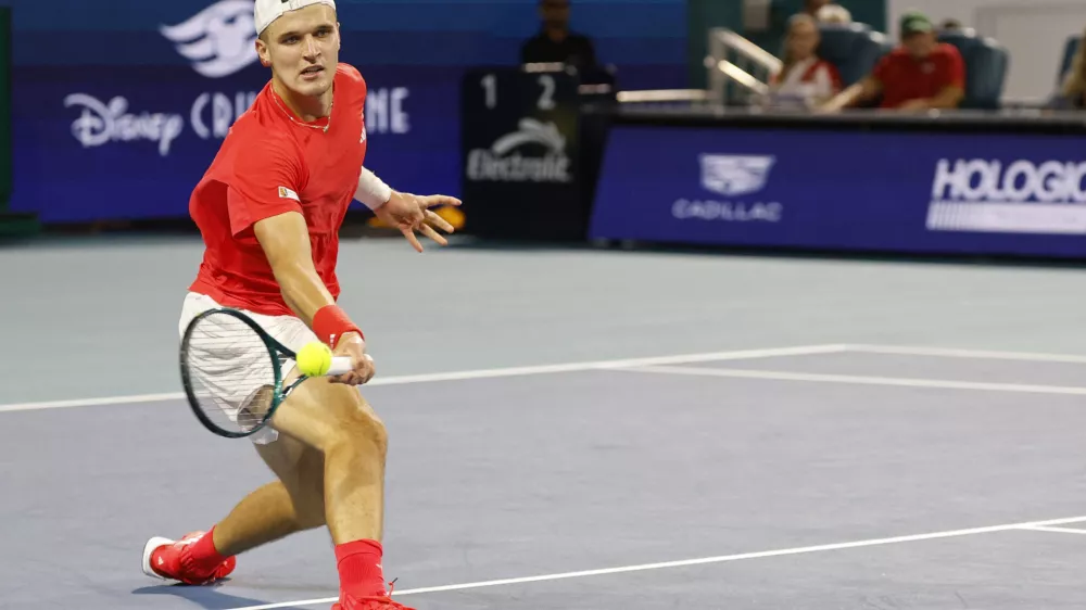 Mar 30, 2025; Miami, FL, USA; Jakub Mensik (CZE) hits a forehand against Novak Djokovic (SRB)(not pictured) in the men's singles championship of the Miami Open at Hard Rock Stadium. Mandatory Credit: Geoff Burke-Imagn Images