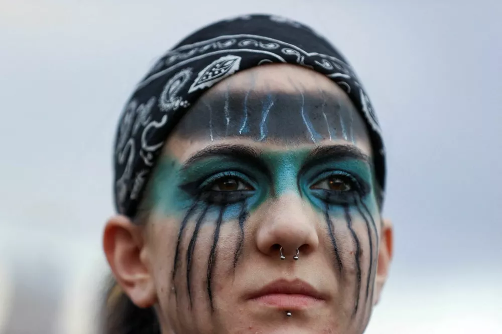 A person takes part in a demonstration against the banning of the annual Pride march and curbing the rights of assembly, in Budapest, Hungary, April 1, 2025. REUTERS/Bernadett Szabo   TPX IMAGES OF THE DAY