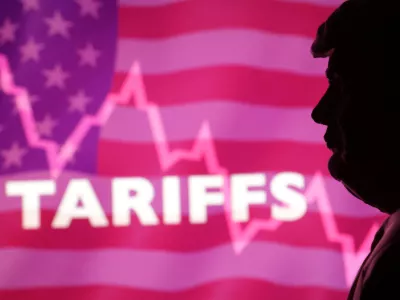 A 3D printed miniature model of U.S. President Donald Trump, U.S. flag, decreasing stock graph and word "Tariffs" are seen in this illustration taken, April 4, 2025. REUTERS/Dado Ruvic/Illustration