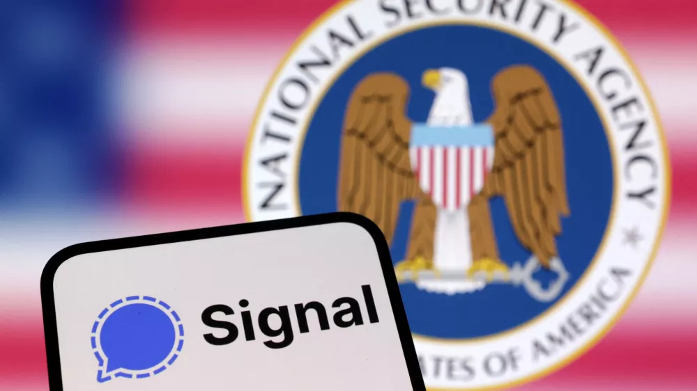 Signal app and National Security Agency of United States logos are seen in this illustration taken March 26, 2025. REUTERS/Dado Ruvic/Illustration