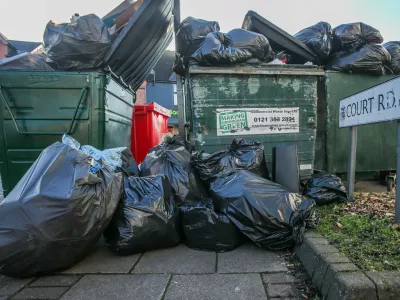 Rubbish on the street in Court Road, Balsall Heath, Birmingham, as bin workers strike for 12 days in February, February 6 2025. Release date February 10 2025. Shocking photos show mountains of fly-tipped rubbish and overflowing bins along Birmingham's streets after bin workers went on strike. Residents say the bankrupt city is now being invaded by giant rats after industrial action left neighbourhoods littered with festering mounds of waste. Families also say they fear for the health of their children after some residential areas were turned into a "makeshift dump" which "stinks". Refuse collectors have walked out on seven dates so far and have scheduled in at least 24 other days in response to fears of wide-scale pay cuts. And the impact of the strikes can already be seen in the Balsall Heath and Small Heath areas of the second city. Locals there say recycling collection is often ignored and businesses in the area haven't had a waste collection in three weeks.