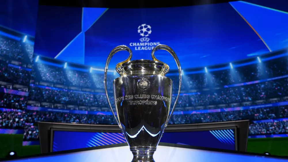 FILE - The trophy is displayed in the hall ahead of the Champions League, league phase, draw, in Monaco, Aug. 29, 2024. (AP Photo/Gregorio Borgia, file)