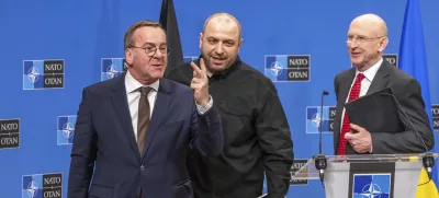 Germany's Defense Minister Boris Pistorius, left, Ukraine's Defense Minister Rustem Umerov, center, and Britain's Defense Secretary John Healey, attend a news conference after a meeting of the Ukraine Defence Contact Group at NATO headquarters in Brussels, Friday, April 11, 2025. (AP Photo/Geert Vanden Wijngaert)