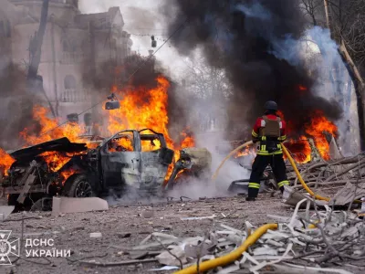 Firefighters work at the site of a Russian missile strike, amid Russia's attack on Ukraine, in central Sumy, Ukraine April 13, 2025. Press service of the State Emergency Service of Ukraine/Handout via REUTERS ATTENTION EDITORS - THIS IMAGE HAS BEEN SUPPLIED BY A THIRD PARTY. DO NOT OBSCURE LOGO.