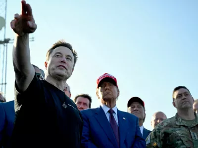 FILE PHOTO: Elon Musk speaks with U.S. President-elect Donald Trump and guests at a viewing of the launch of the sixth test flight of the SpaceX Starship, in Brownsville, Texas, U.S., November 19, 2024. Brandon Bell/Pool via REUTERS/File Photo