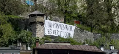 16 April 2025, Austria, Salzburg: A banner reading "And Porsche said let there be a hole" is displayed on the Kapuzinerberg in Salzburg, where activists stage a protest against the planned construction of a private access tunnel. The project, intended to connect a villa purchased in 2020 by Porsche Supervisory Board Chairman Wolfgang Porsche, has sparked public opposition. Photo: Unbekannt/PRIVATTUNNELSTOPPEN/APA/dpa - ACHTUNG: Nur zur redaktionellen Verwendung im Zusammenhang mit der aktuellen Berichterstattung und nur mit vollständiger Nennung des vorstehenden Credits