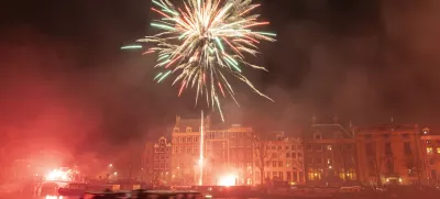 AJAX supporters celebrate the 125th anniversary of the football club. Thousands of fans of the historic Dutch FC travel and gather in Amsterdam, the Netherlands, on March 18, 2025, to march through the city and set up fireworks and flares while chanting their favorite slogans. The fans walk until the Amstel River where they set up a show with multiple fireworks lighting up the night sky of the capital. (Photo by Gene Medi/NurPhoto)NO USE FRANCE