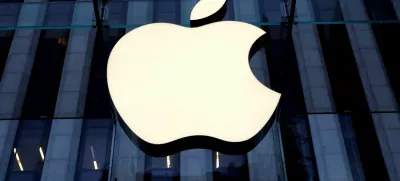 FILE PHOTO: The Apple Inc. logo is seen hanging at the entrance to the Apple store on 5th Avenue in Manhattan, New York, U.S., October 16, 2019. REUTERS/Mike Segar/File Photo