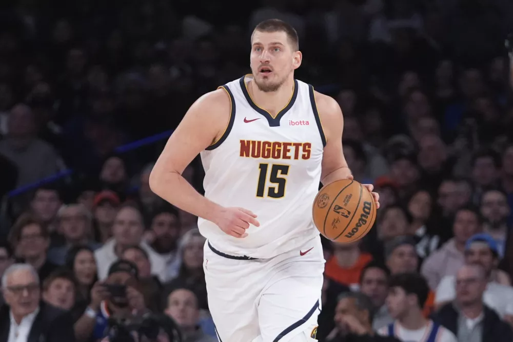 Denver Nuggets' Nikola Jokic (15) looks to pass during the second half of an NBA basketball game against the New York Knicks Wednesday, Jan. 29, 2025, in New York. (AP Photo/Frank Franklin II)