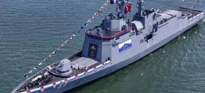 This photo provided by the North Korean government shows a new naval destroyer unveiled at a western port in Nampo, North Korea, Friday, April 25, 2025. Independent journalists were not given access to cover the event depicted in this image distributed by the North Korean government. The content of this image is as provided and cannot be independently verified. Korean language watermark on image as provided by source reads: "KCNA" which is the abbreviation for Korean Central News Agency. (Korean Central News Agency/Korea News Service via AP)