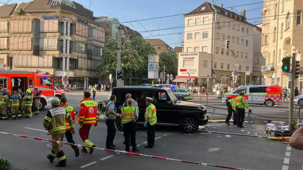 02 May 2025, Baden-Württemberg, Stuttgart: Police officers and emergency workers present at the scene where a car drove into people. According to police, a car has driven into a group of people in Stuttgart city center. Three people have been injured so far. The driver has been arrested, a police spokeswoman said. Photo: Marco Krefting/dpa