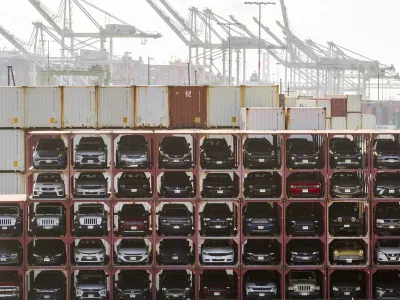 Vehicles line a shipping terminal at the Port of Oakland on Tuesday, April 15, 2025, in Oakland, Calif. (AP Photo/Noah Berger)