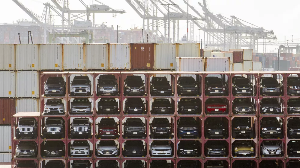 Vehicles line a shipping terminal at the Port of Oakland on Tuesday, April 15, 2025, in Oakland, Calif. (AP Photo/Noah Berger)