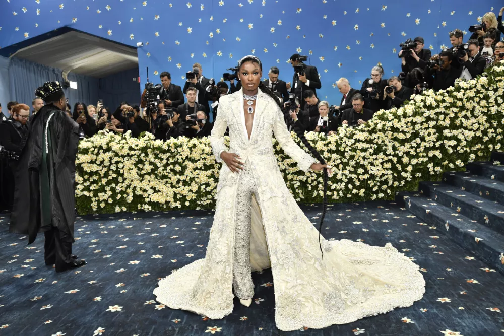 Coco Jones attends The Metropolitan Museum of Art's Costume Institute benefit gala celebrating the opening of the "Superfine: Tailoring Black Style" exhibition on Monday, May 5, 2025, in New York. (Photo by Evan Agostini/Invision/AP)