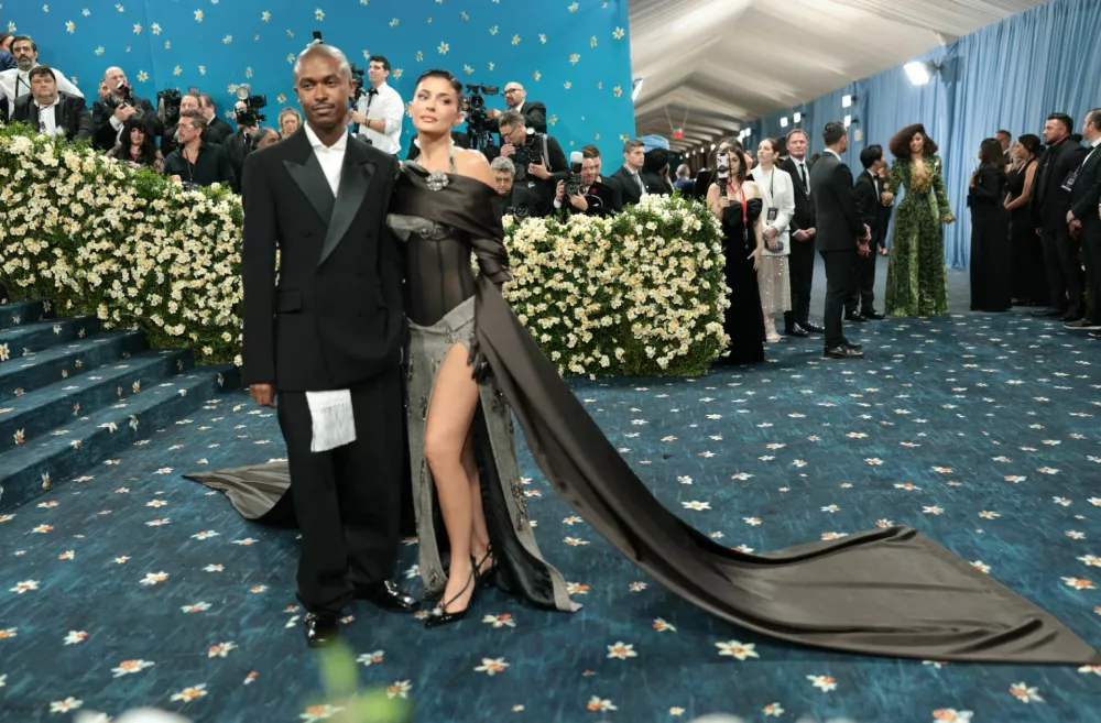 Maximilian Davis and Kylie Jenner poses during the Met Gala, an annual fundraising gala held for the benefit of the Metropolitan Museum of Art's Costume Institute with this year's theme 'Superfine: Tailoring Black Style,' in New York City, New York, U.S., May 5, 2025. REUTERS/Mario Anzuoni