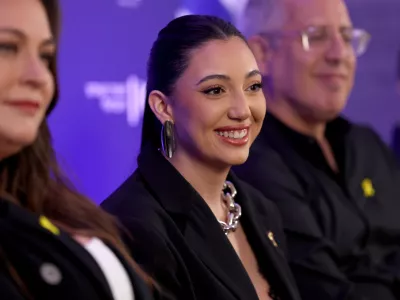 Israel's Eurovision 2025 representative and survivor of the October 7, 2023 attack, Yuval Raphael, attends a press conference after premiering her song 'New Day Will Rise' in Tel Aviv, Israel March 9, 2025. REUTERS/Ronen Zvulun