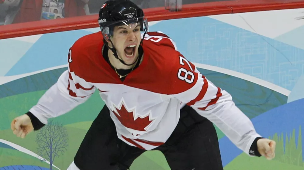 Canada's Sidney Crosby celebrates after scoring the game winning goal against the U.S. during overtime in their men's ice hockey gold medal game at the Vancouver 2010 Winter Olympics February 28, 2010.   REUTERS/Todd Korol (CANADA)