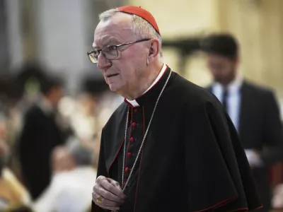 Cardinal Pietro Parolin arrives in St. Peter's Basilica to attend a mass on the eight of nine days of mourning for late Pope Francis, at the Vatican, Saturday, May 3, 2025. (AP Photo/Alessandra Tarantino)