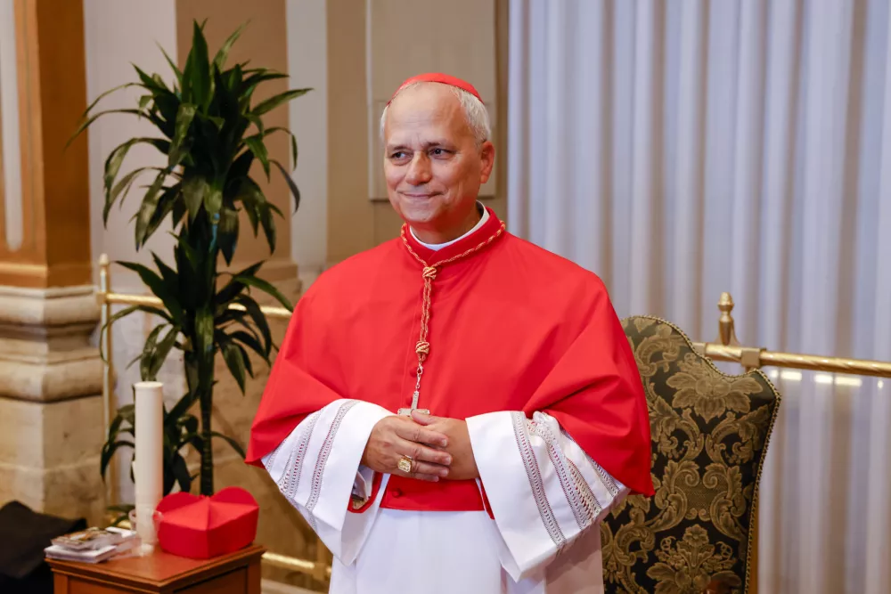 FILE - Cardinal Robert Francis Prevost, Prefect of the Dicastery for Bishops, poses for a photo at the end of the consistory where Pope Francis elevated 21 new cardinals in St. Peter's Square at The Vatican, Sept. 30, 2023. (AP Photo/Riccardo De Luca, File)