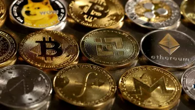 FILE PHOTO: Representations of cryptocurrencies are seen in this illustration, August 10, 2022. REUTERS/Dado Ruvic/Illustration/File Photo/File Photo