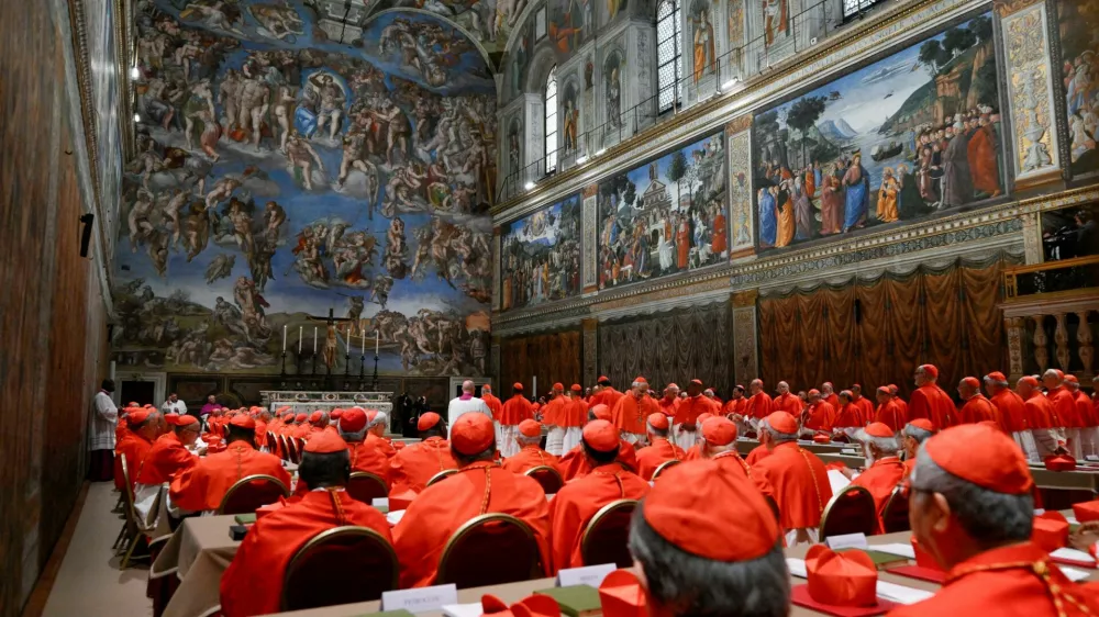 Cardinals pray in the Sistine Chapel, ahead of the conclave to elect the next pope at the Vatican, May 7, 2025. Vatican Media/Handout via REUTERS  THIS IMAGE HAS BEEN SUPPLIED BY A THIRD PARTY