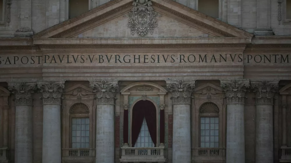 A view shows the central balcony (Loggia delle Benedizioni) of St. Peter's Basilica, after white smoke appeared from the chimney on the Sistine Chapel, indicating that a new pope has been elected, as seen from Rome, Italy May 8, 2025.  REUTERS/Alkis Konstantinidis