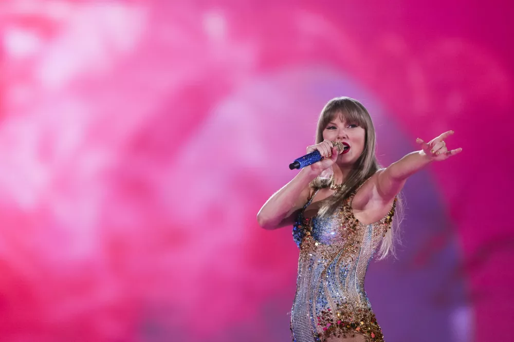 Taylor Swift performs during "The Eras Tour" in Vancouver, British Columbia, Dec. 6, 2024. (AP Photo/Lindsey Wasson)