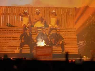 KAJ from Sweden performs the song "Bara Bada Bastu" during the dress rehearsal for the first semi-final of the 69th Eurovision Song Contest, in Basel, Switzerland, Monday, May 12, 2025. (AP Photo/Martin Meissner)