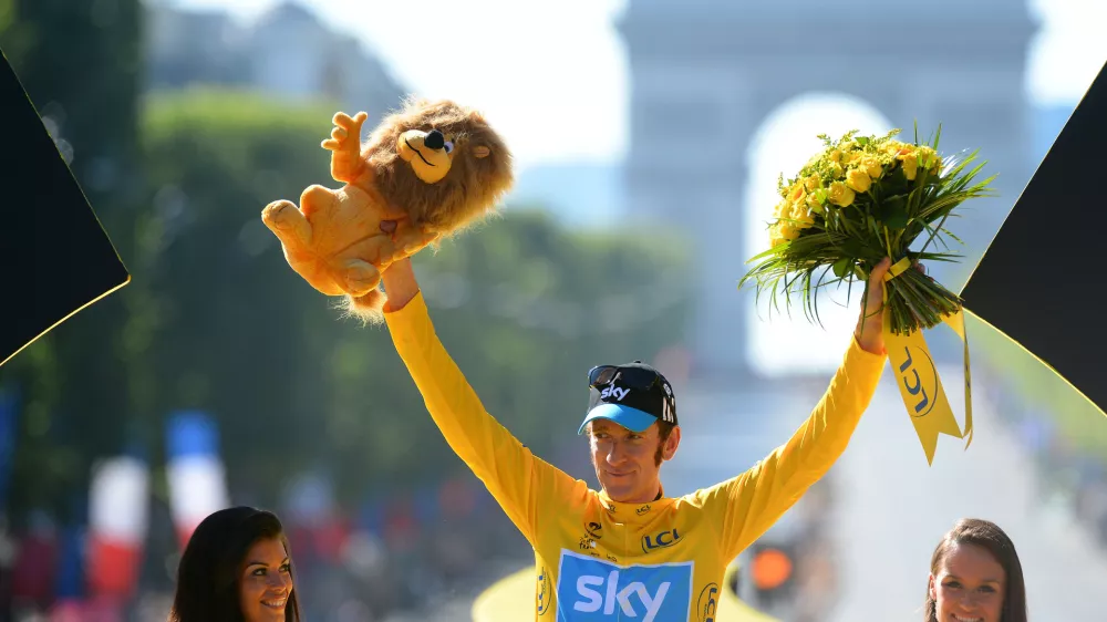 Bradley Wiggins, winner of the 2012 Tour de France cycling race on the podium of the the Tour de France cycling race in Paris, France, Sunday July 22, 2012. (AP Photo/Jerome Prevost, Pool)