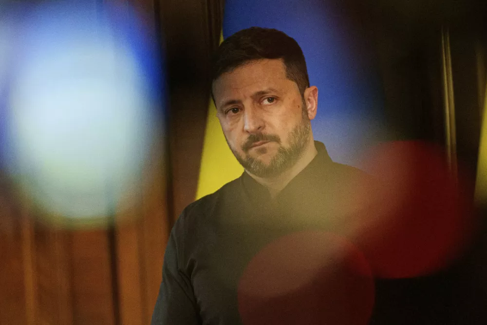 Ukrainian President Volodymyr Zelenskyy speaks to journalists during a press conference in Kyiv, Ukraine, Tuesday, May 13, 2025. (AP Photo/Evgeniy Maloletka)