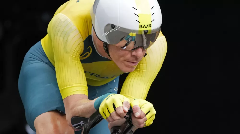 FILE - Rohan Dennis of Australia competes during the men's cycling individual time trial at the 2020 Summer Olympics, July 28, 2021, in Oyama, Japan. (AP Photo/Christophe Ena,File)