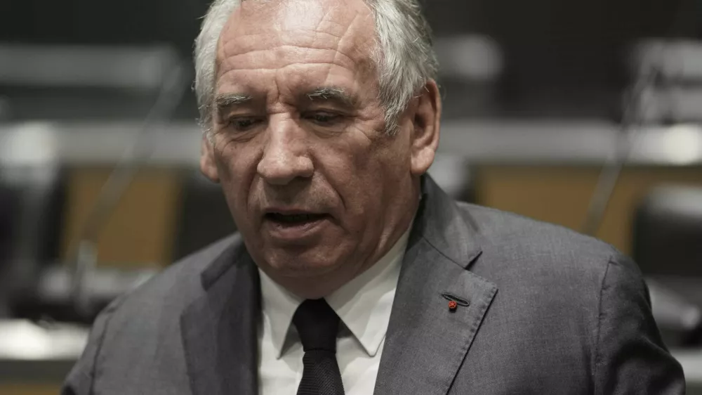 French Prime Minister Francois Bayrou arrives to face questions from a parliamentary inquiry into alleged abuse at a Catholic school amid accusations he has hidden what he knows about the scandal, in Paris, Wednesday May 14, 2025. (AP Photo/Aurelien Morissard)