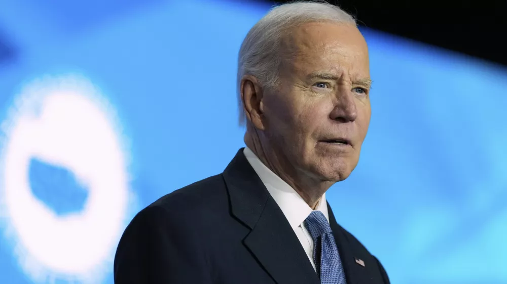 FILE - President Joe Biden waits to speak at the U.S. Conference of Mayors in Washington, Jan. 17, 2025. (AP Photo/Alex Brandon, File)