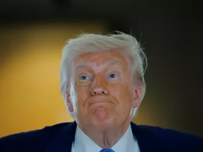 U.S. President Donald Trump reacts as he visits the Abrahamic Family House during his visit in Abu Dhabi, United Arab Emirates, May 16, 2025. REUTERS/Brian Snyder