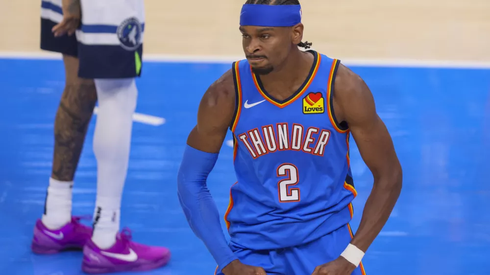 Oklahoma City Thunder guard Shai Gilgeous-Alexander reacts after a play against the Minnesota Timberwolves during the first half of Game 2 of an NBA basketball Western Conference Finals playoff series Thursday, May 22, 2025, in Oklahoma City. (AP Photo/Nate Billings)