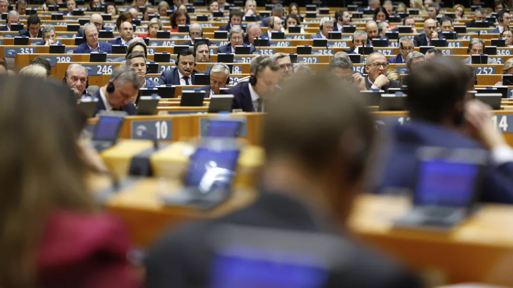 Members of European Parliament listen to a speech by Slovenia's President Natasa Pirc Musar during a plenary session at the European Parliament building in Brussels, Wednesday, May 21, 2025. (AP Photo/Geert Vanden Wijngaert)