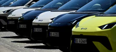 FILE PHOTO: BYD Dolphin Surf electric cars are parked infront of the venue where BYD carmaker holds a vehicle presentation event in Berlin, Germany May 21, 2025. REUTERS/Annegret Hilse/File Photo
