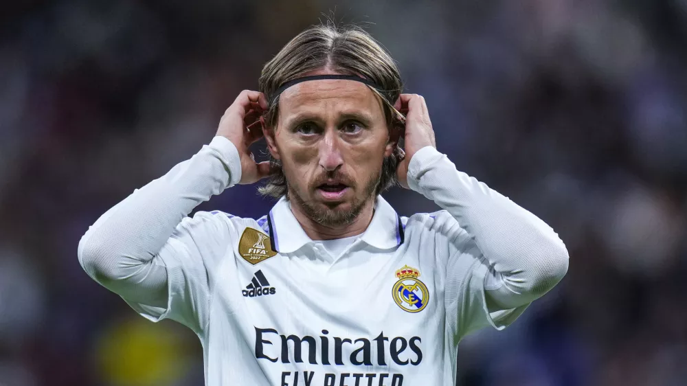 FILE - Real Madrid's Luka Modric gestures during Spanish La Liga soccer match between Real Madrid and Celta Vigo at the Santiago Bernabeu stadium in Madrid, Spain, Saturday, April 22, 2023. Real Madrid midfielder Luka Modric has injured his left thigh barely a week ahead of the Copa del Rey final and the Champions League semifinals, the Spanish club said Friday, April 28, 2023. (AP Photo/Manu Fernandez, File)